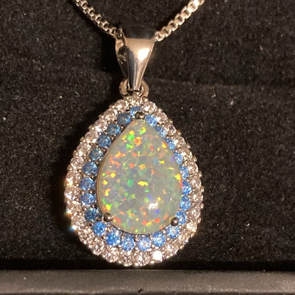 Beautiful fire Opal with light blue and clear stones stamped 925 - Picture 3 of 9
